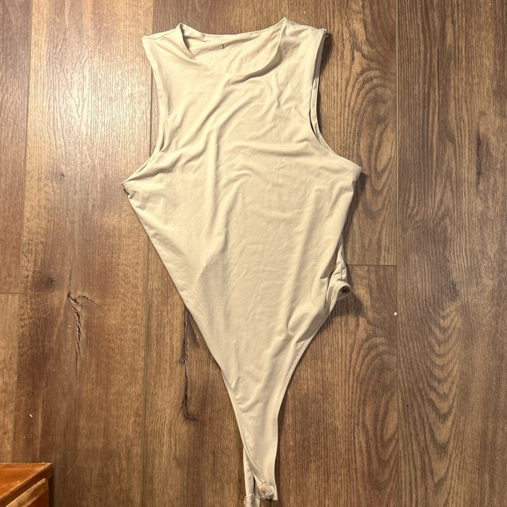 Tan body suit